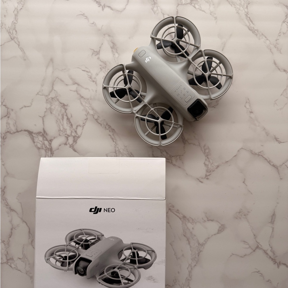 DJI NEO Compact Drone in Light Gray- like new. Open box